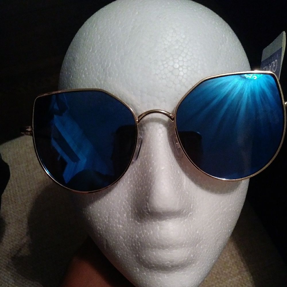 Gold frame blue shade sunglasses